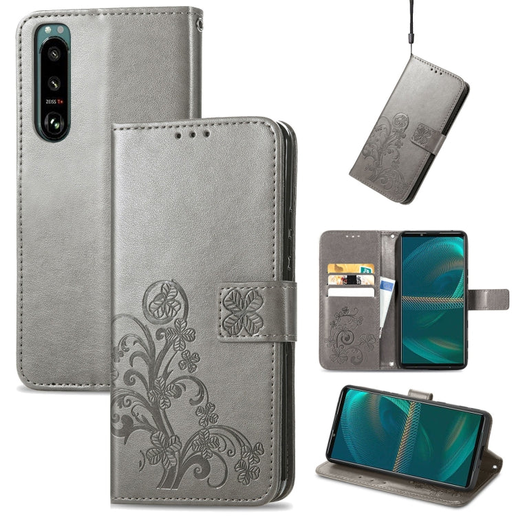 Four-leaf Clasp Embossed Buckle Leather Phone Case, For Samsung Galaxy S23 5G, For Samsung Galaxy S23+ 5G, For Samsung Galaxy S23 Ultra 5G, For Sony Xperia 5 IV, For Xiaomi Redmi A1, For Xiaomi Redmi Note 11T