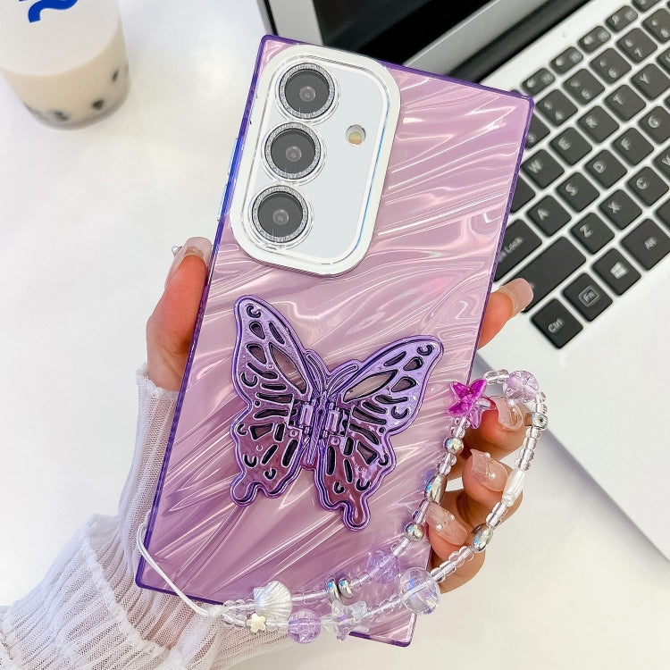 Plating Glitter Lens Film Texture Butterfly Holder Wristband Phone Case, For Samsung Galaxy S25+ 5G